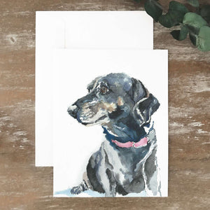 A2 greeting card of small black dachshund