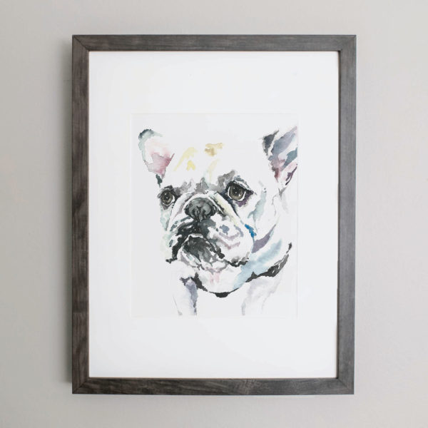 Watercolor of a French bulldog in a gray frame