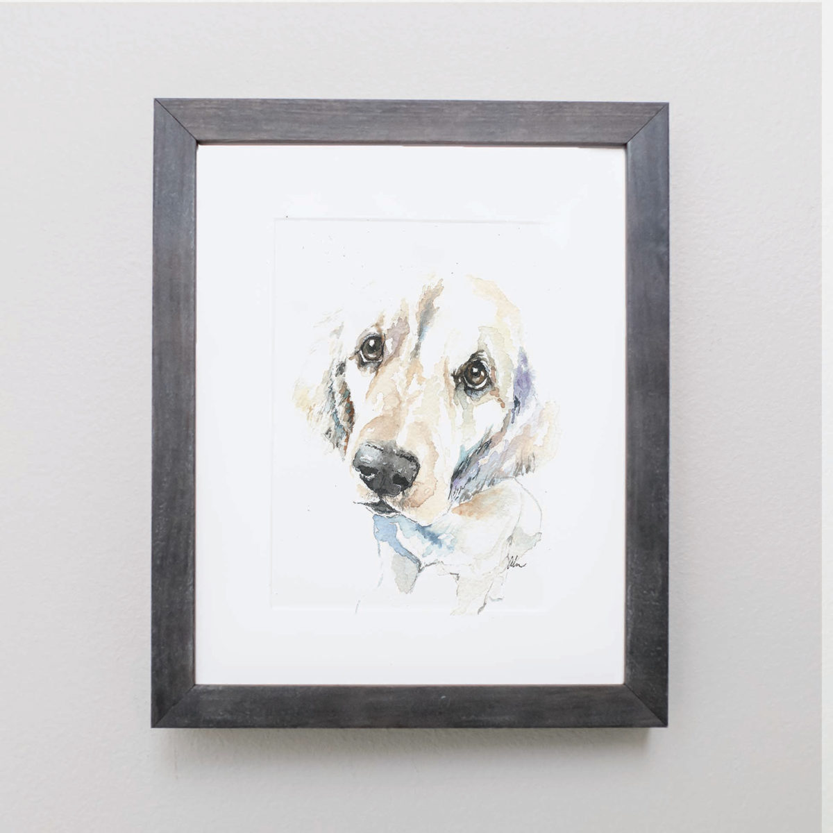 Watercolor of a yellow lab in a gray frame