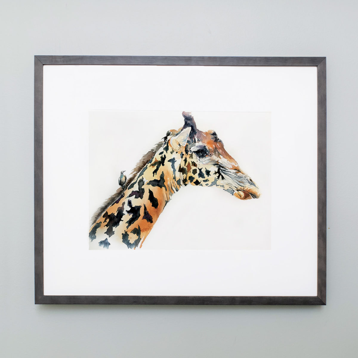 Watercolor of a giraffe framed