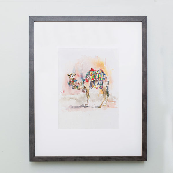 Watercolor of a camel in Petra in a gray frame