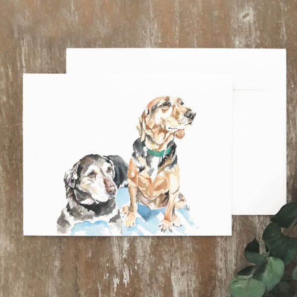 A2 greeting card of a black and light brown dog together