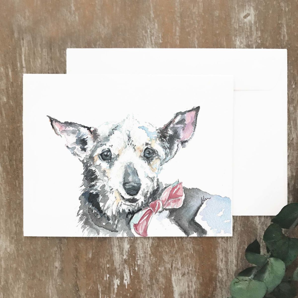 A2 greeting card of a tiny dog named George wearing a red bowtie