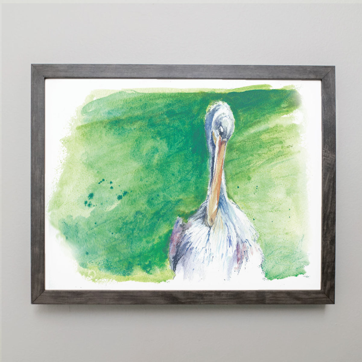 Watercolor of pink-backed pelican in gray frame