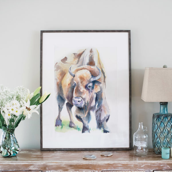Watercolor of American bison in gray frame and styled with flowers